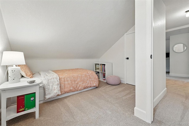 6830 Lamar St, Arvada, CO 80003 - bedroom with carpet, lofted ceiling, and baseboards