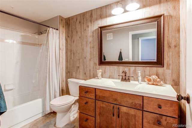 bathroom featuring toilet, tile patterned flooring, shower / bathtub combination with curtain, and vanity