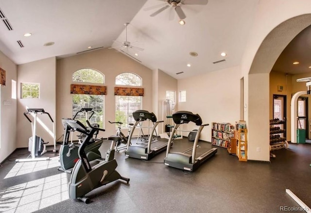 workout area with baseboards, arched walkways, a ceiling fan, and recessed lighting