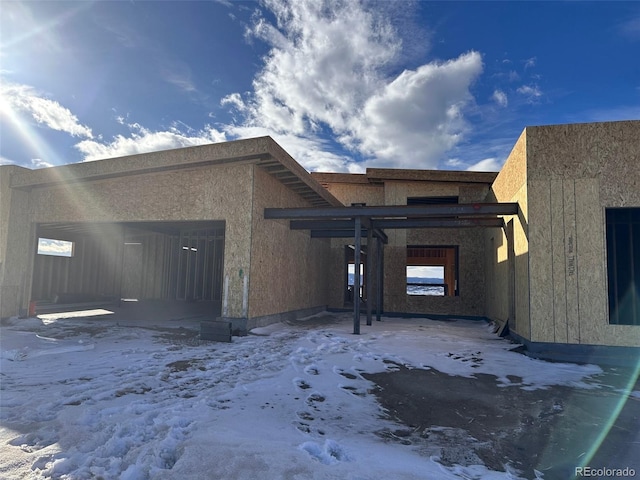 view of snow covered property