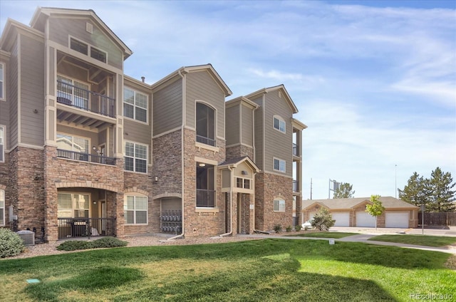 9227 Rolling Way Unit 201, Parker, CO 80134 - view of property featuring central AC unit