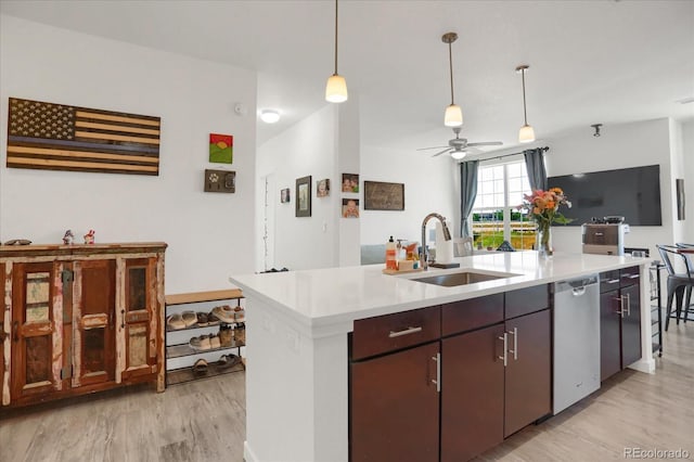 9227 Rolling Way Unit 201, Parker, CO 80134 - kitchen featuring a sink, dishwasher, light wood-type flooring, a ceiling fan, and light countertops