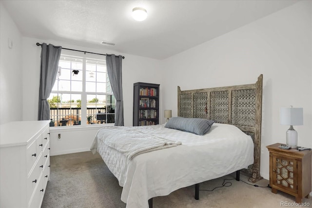9227 Rolling Way Unit 201, Parker, CO 80134 - carpeted bedroom featuring baseboards