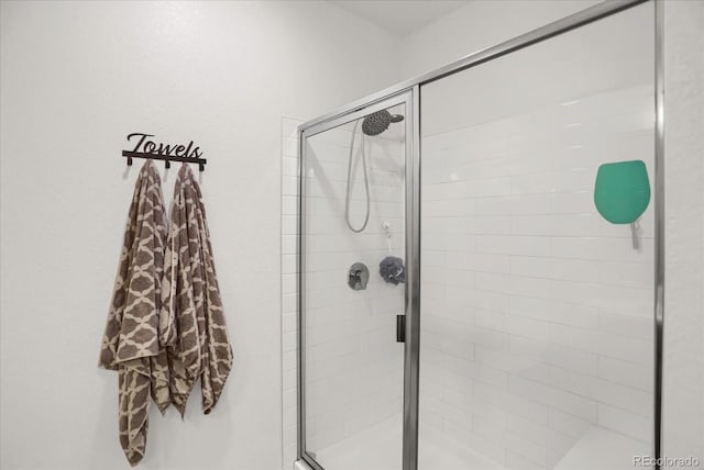 9227 Rolling Way Unit 201, Parker, CO 80134 - bathroom featuring a shower stall