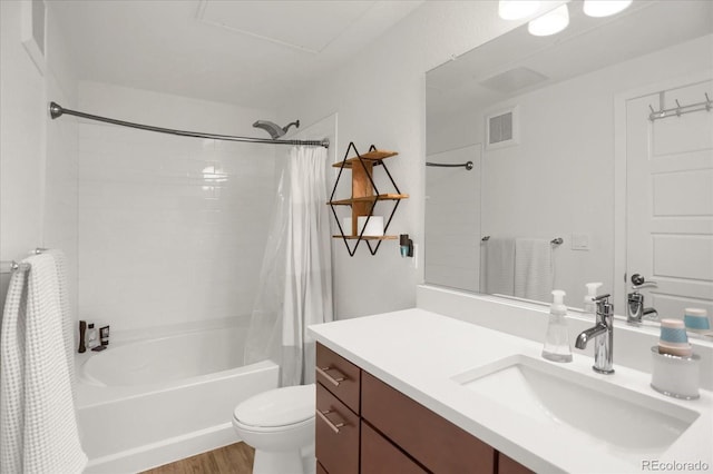 9227 Rolling Way Unit 201, Parker, CO 80134 - full bath featuring shower / bath combination with curtain, vanity, toilet, and wood finished floors