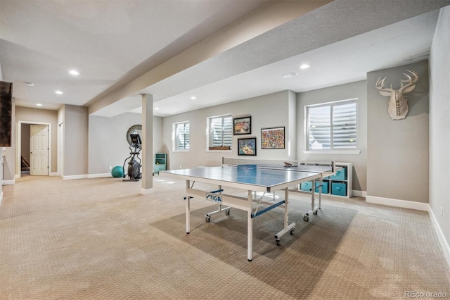 playroom featuring light colored carpet