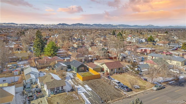 aerial view at dusk with a mountain view