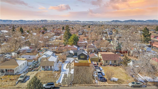 aerial view at dusk with a mountain view