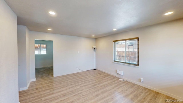 2533 E 90th Pl, Thornton, CO 80229 - unfurnished room featuring recessed lighting, baseboards, visible vents, and light wood-style flooring