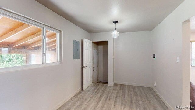 2533 E 90th Pl, Thornton, CO 80229 - interior space with baseboards, light wood-style flooring, and electric panel