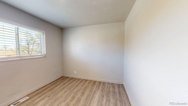 2533 E 90th Pl, Thornton, CO 80229 - unfurnished room with light wood-style floors, baseboards, and visible vents