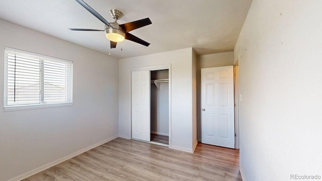 2533 E 90th Pl, Thornton, CO 80229 - unfurnished bedroom with a closet, light wood-style flooring, ceiling fan, and baseboards