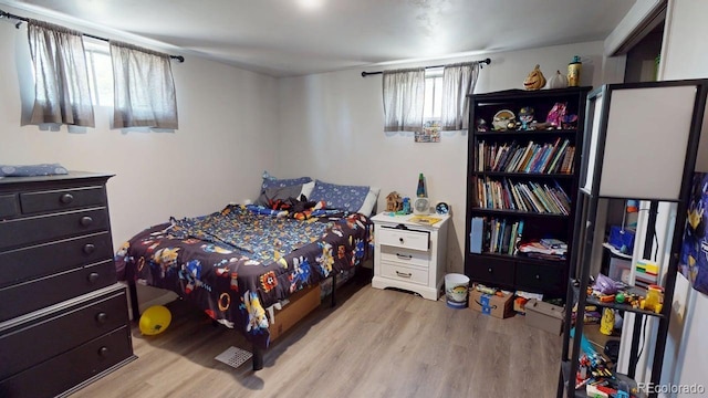 2533 E 90th Pl, Thornton, CO 80229 - bedroom featuring wood finished floors