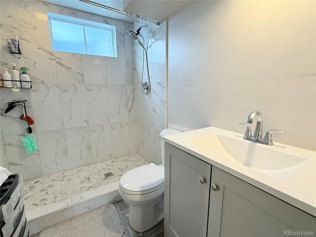 2533 E 90th Pl, Thornton, CO 80229 - bathroom with vanity, a stall shower, and toilet