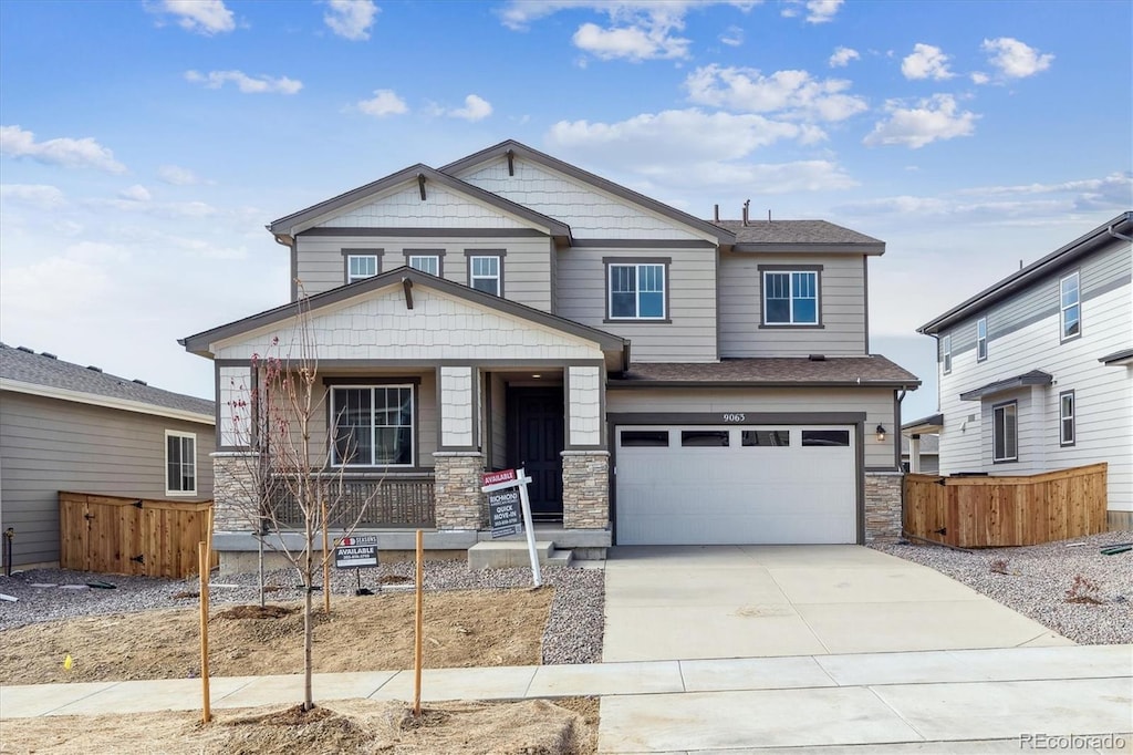 craftsman-style house featuring a garage