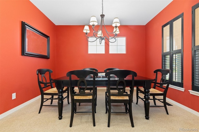 2488 Lake Vista Dr, Broomfield, CO 80023 - carpeted dining area featuring healthy amount of natural light and a chandelier