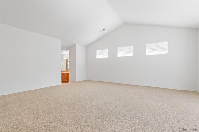 2488 Lake Vista Dr, Broomfield, CO 80023 - additional living space with vaulted ceiling and light colored carpet