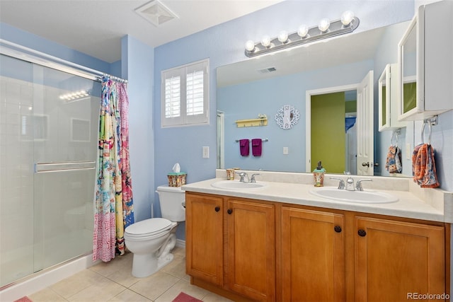 2488 Lake Vista Dr, Broomfield, CO 80023 - bathroom featuring a shower stall, tile patterned flooring, and double vanity