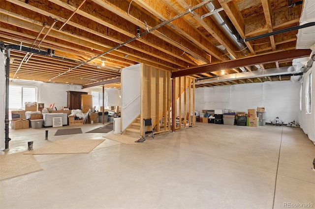 2488 Lake Vista Dr, Broomfield, CO 80023 - basement with healthy amount of natural light and stairway