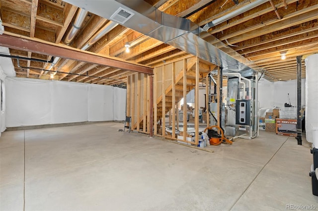 2488 Lake Vista Dr, Broomfield, CO 80023 - unfinished basement featuring heating unit and stairs