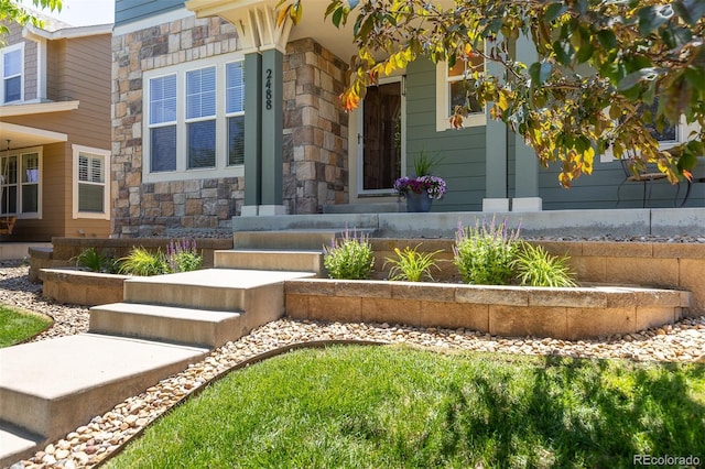 2488 Lake Vista Dr, Broomfield, CO 80023 - doorway to property featuring stone siding