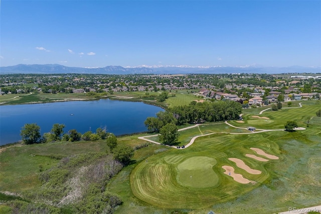 2488 Lake Vista Dr, Broomfield, CO 80023 - aerial overview of property's location with a water and mountain view, a local golf course, and nearby suburban area