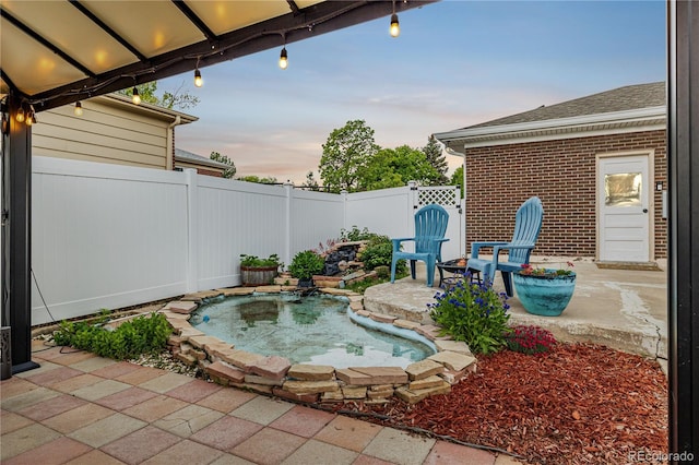 10478 Ogden St, Northglenn, CO 80233 - view of pool featuring a fenced backyard, a patio, and an in-ground hot tub