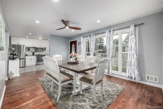 10478 Ogden St, Northglenn, CO 80233 - dining area featuring wood finished floors, recessed lighting, ceiling fan, and baseboards