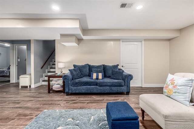 10478 Ogden St, Northglenn, CO 80233 - living room with stairs, baseboards, wood finished floors, and recessed lighting