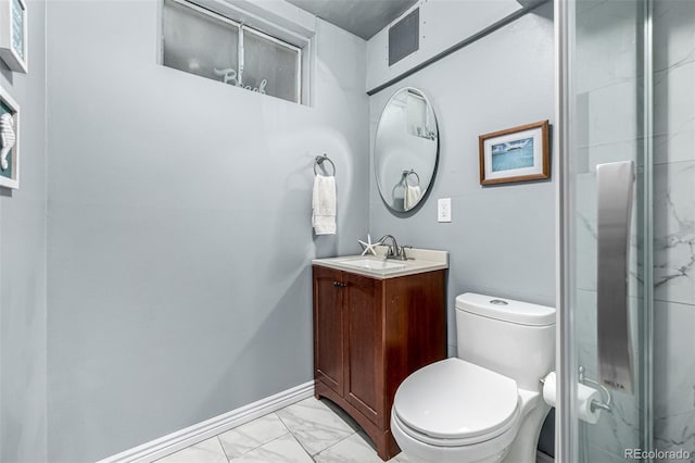 10478 Ogden St, Northglenn, CO 80233 - full bath featuring vanity, marble look tile flooring, a shower stall, and toilet