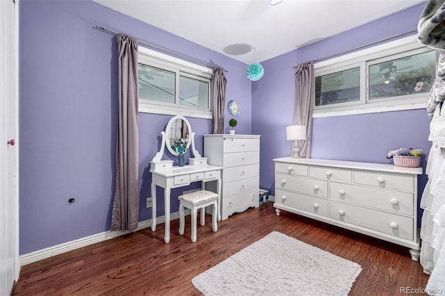 10478 Ogden St, Northglenn, CO 80233 - bedroom featuring dark wood-style floors and baseboards