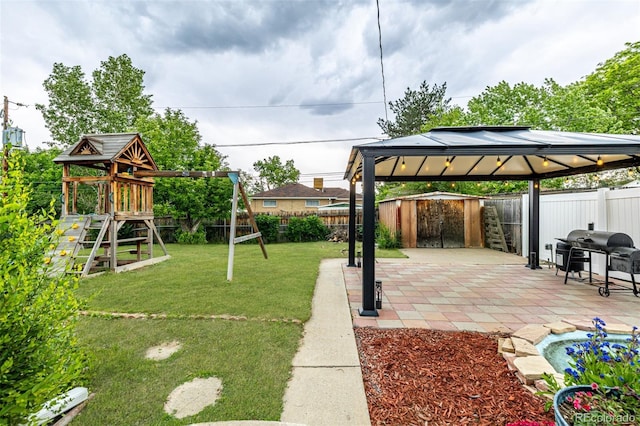 10478 Ogden St, Northglenn, CO 80233 - view of yard with a gazebo, a playground, and a patio area