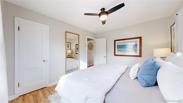 bedroom featuring ceiling fan and light wood-type flooring