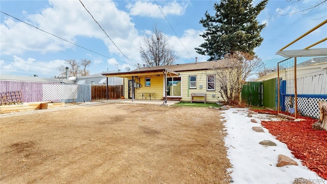 rear view of property with a patio