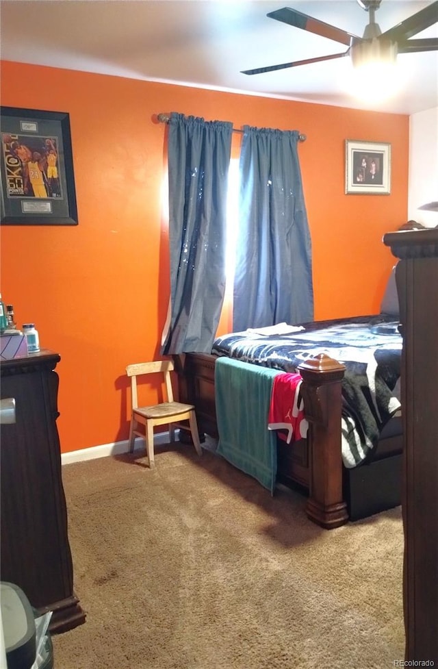 carpeted bedroom featuring a ceiling fan