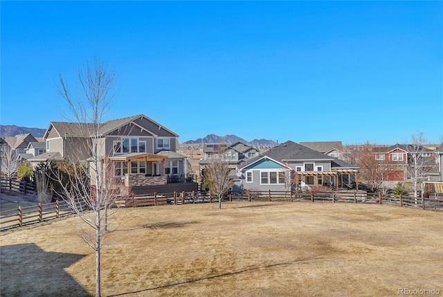 8726 Gardenia Cir, Arvada, CO 80005 - view of community featuring a fenced backyard, a residential view, and a mountain view