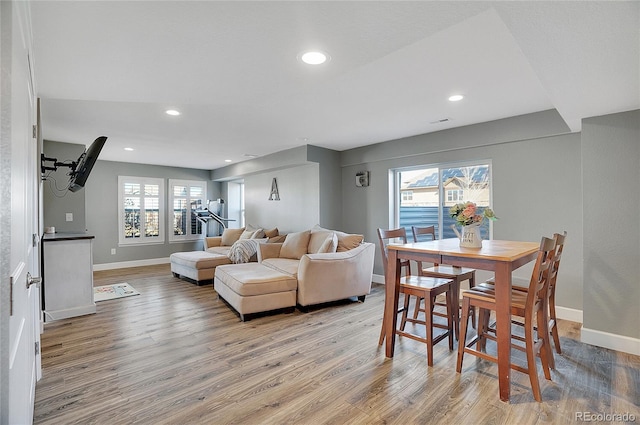8726 Gardenia Cir, Arvada, CO 80005 - living room featuring light wood finished floors, baseboards, and recessed lighting