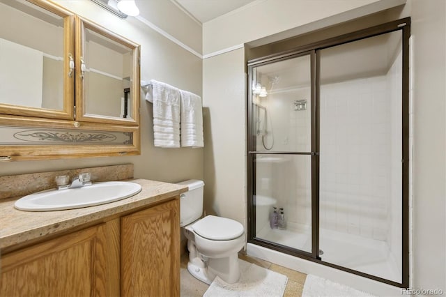 full bath featuring toilet, a stall shower, and vanity