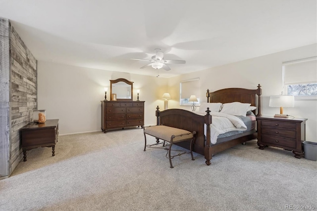 carpeted bedroom with a ceiling fan