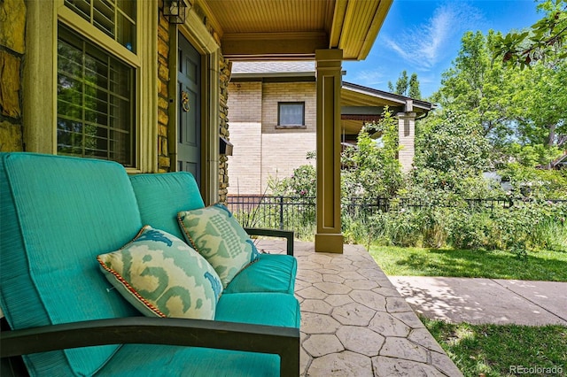 view of patio featuring a porch