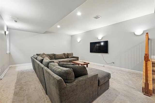 carpeted living room with baseboards and recessed lighting
