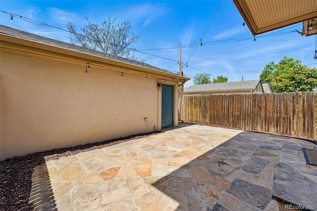 view of patio / terrace with fence