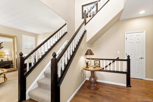 6772 Tiger Tooth, Littleton, CO 80124 - stairs featuring wood finished floors and recessed lighting