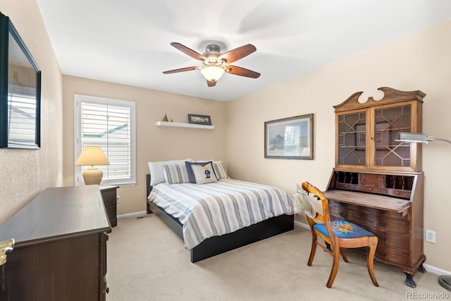 6772 Tiger Tooth, Littleton, CO 80124 - bedroom with a ceiling fan and light colored carpet