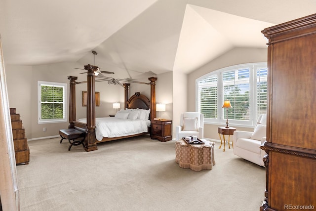 6772 Tiger Tooth, Littleton, CO 80124 - bedroom with lofted ceiling, multiple windows, and light carpet