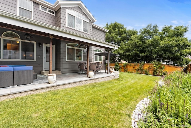 6772 Tiger Tooth, Littleton, CO 80124 - view of yard featuring a patio area and an outdoor living space