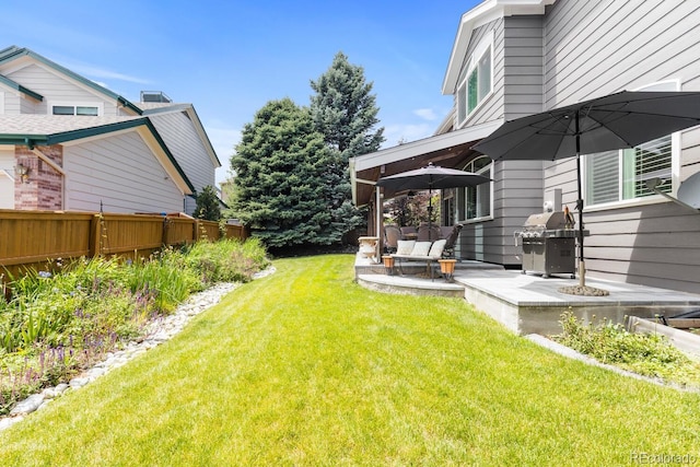 6772 Tiger Tooth, Littleton, CO 80124 - view of grassy yard featuring a patio