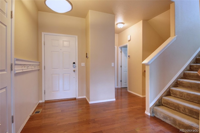 5947 Cumbre Vista Way, Colorado Springs, CO 80924 - foyer entrance with wood finished floors and stairway