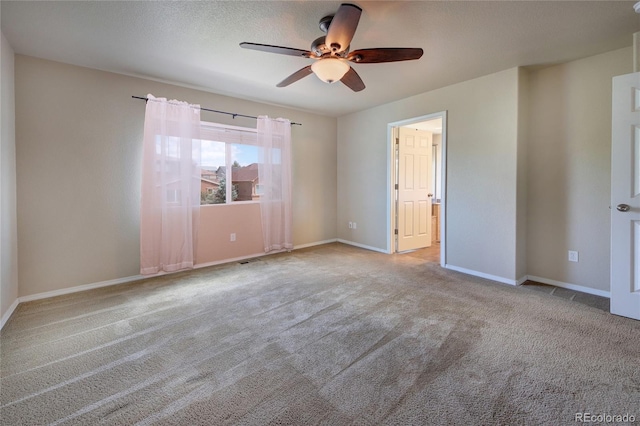 5947 Cumbre Vista Way, Colorado Springs, CO 80924 - unfurnished bedroom featuring carpet floors, a ceiling fan, and ensuite bath
