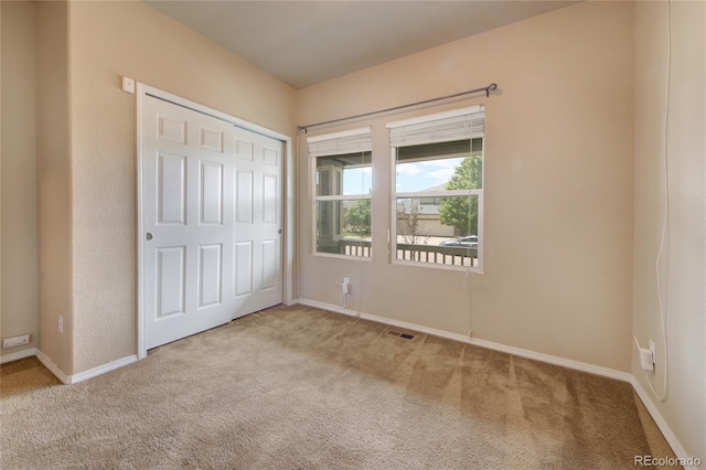 5947 Cumbre Vista Way, Colorado Springs, CO 80924 - unfurnished bedroom featuring carpet and a closet